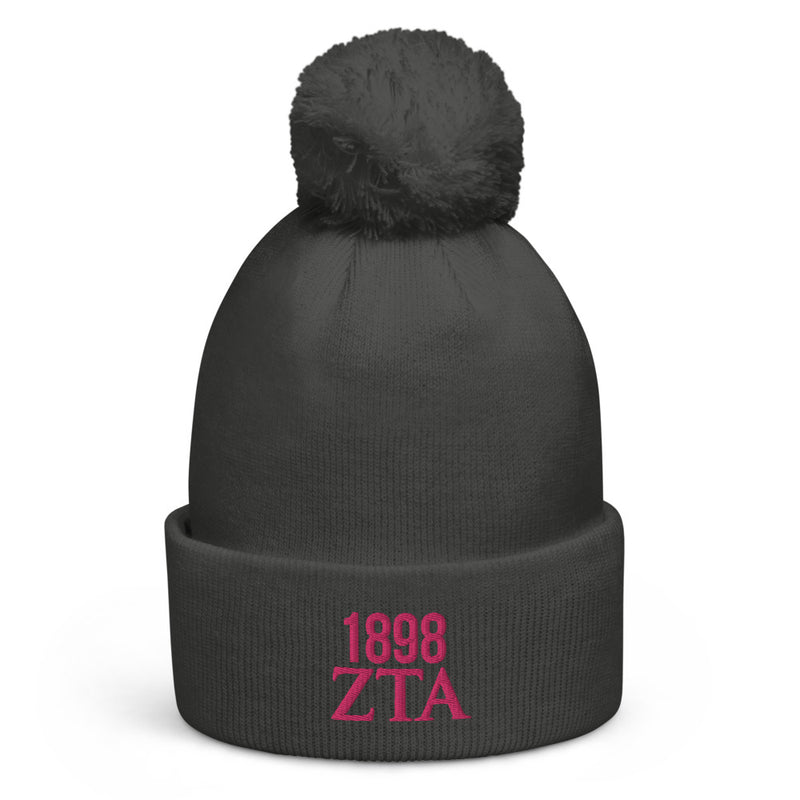Zeta Tau Alpha 1898 Founding Date Pom-Pom Beanie in gray with pink embroidery