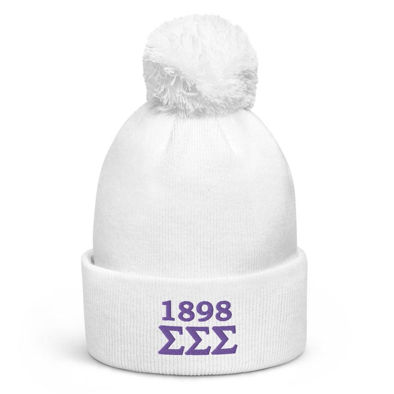 Tri Sigma 1898 Pom Pom Beanie showing purple embroidery on front