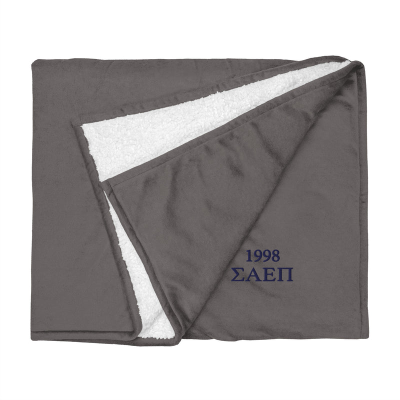 Sigma Alpha Epsilon Pi Greek Letters Sherpa Blanket in gray shown flat