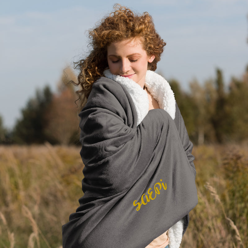 Sigma Alpha Epsilon Pi Embroidered Sherpa Blanket in gray on model