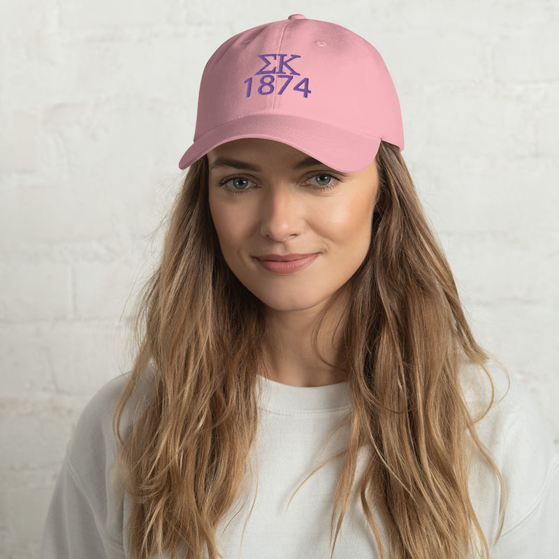 Sigma Kappa 1874 Embroidered Baseball Cap in pink shown on model&