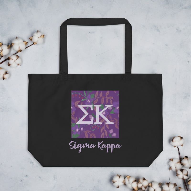 Sigma Kappa Greek Letters Large Organic Tote Bag in black shown flat