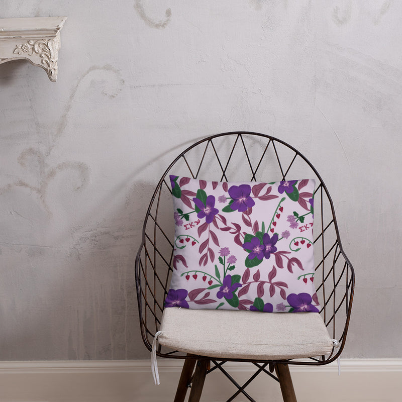 Sigma Kappa Dove Mascot Reversible Pillow showing back of pillow with violet floral print