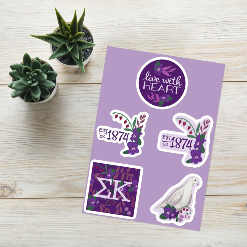 Sigma Kappa Sorority Sticker Sheet with 5 designs shown in lifestyle setting