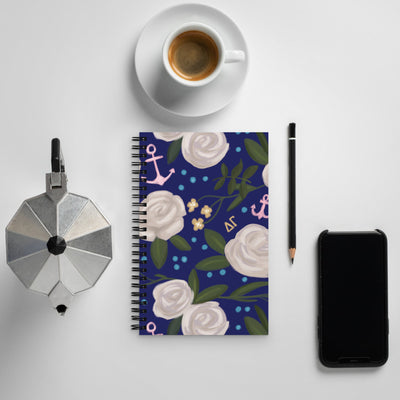 Delta Gamma Rose Floral Print Spiral Notebook shown with coffee