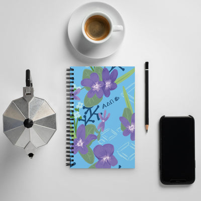 Alpha Delta Pi Woodland Violet Print Spiral Notebook shown with coffee scene