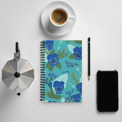 Tri Delta Pansy Floral Print Spiral Notebook shown with coffee