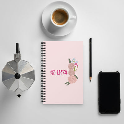 Gamma Phi Beta 1874 Founding Year Spiral Notebook shown with coffee