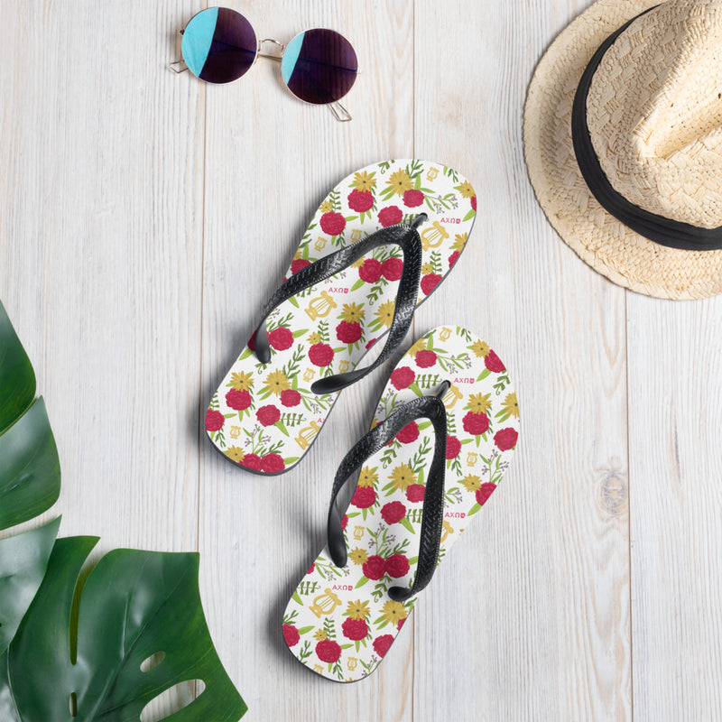 Alpha Chi Omega Carnation Lyre Flip-Flops, White shown with hat and sunglasses
