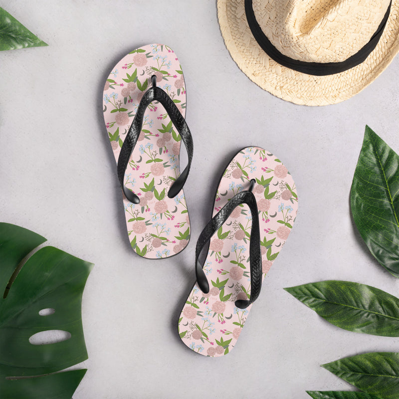 Gamma Phi Beta Pink Floral Flip-Flops shown with straw hat
