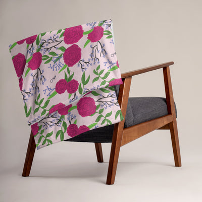 Phi Mu Pink Carnation Floral Print Throw Blanket on chair