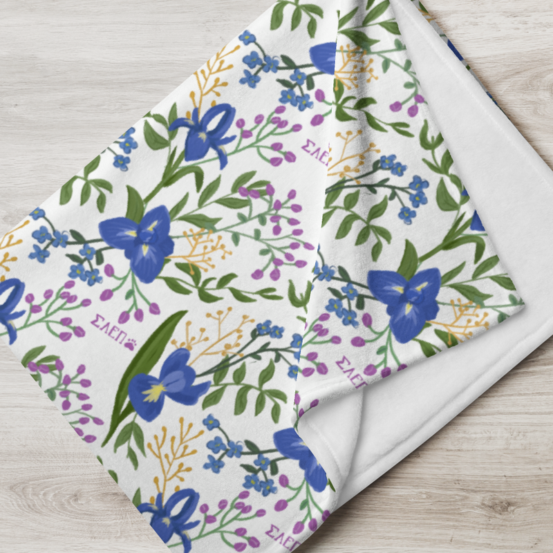 Sigma Alpha Epsilon Pi Floral Print Throw Blanket, White folded showing solid white back