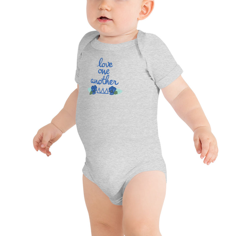 Tri Delta Love One Another Baby Onesie in athletic gray