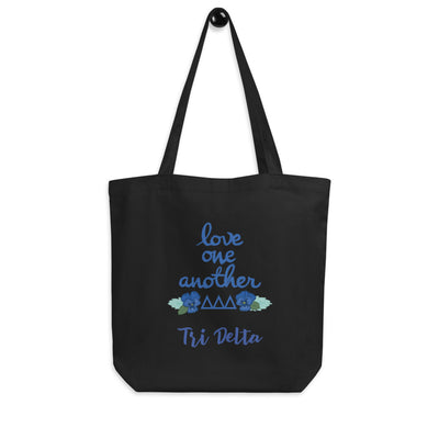 Tri Delta Sorority Tote Bag in black shown hanging on hook 