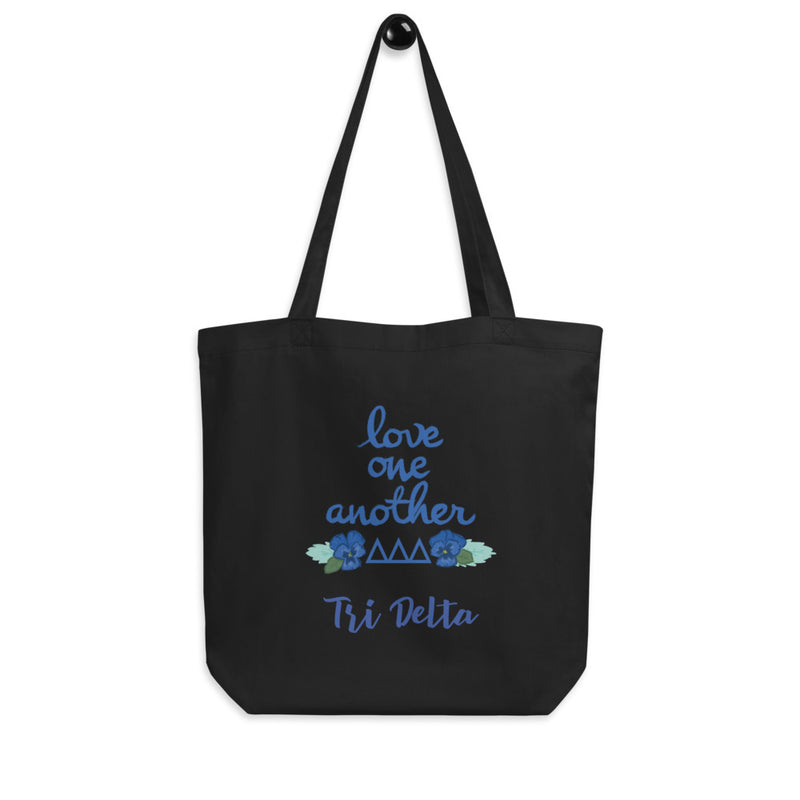 Tri Delta Sorority Tote Bag in black shown hanging on hook 