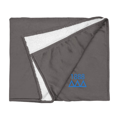 Tri Delta Plush Embroidered Sherpa Blanket in gray shown flat