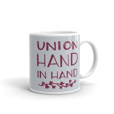 Front of Alpha Phi Union Hand in Hand motto mug.