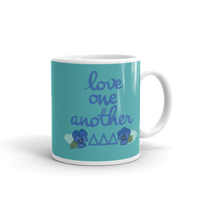 Tri Delta "Love One Another" Glossy Mug shown with handle on right