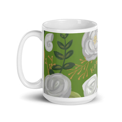 Kappa Delta Floral Pattern Glossy Mug in 15 oz size with handle on left