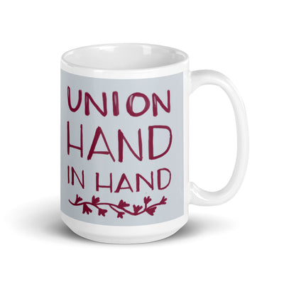 Front of Alpha Phi Union Hand in Hand 15 ounce mug.