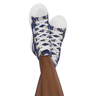 Cross legged view of Dee Gee Rose Floral Print High Top Canvas Shoes, Navy Blue shown on woman's crossed legs