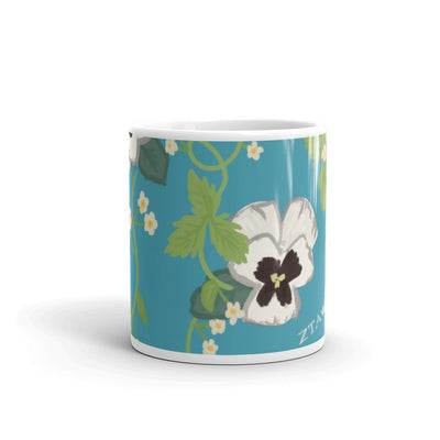 Zeta Tau Alpha Violet Floral Print Mug in Turquoise showing print wrapping around 11 oz mug