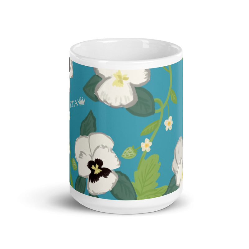 Zeta Tau Alpha Violet Floral Print Mug in Turquoise in 15 oz size showing design wraps around mug